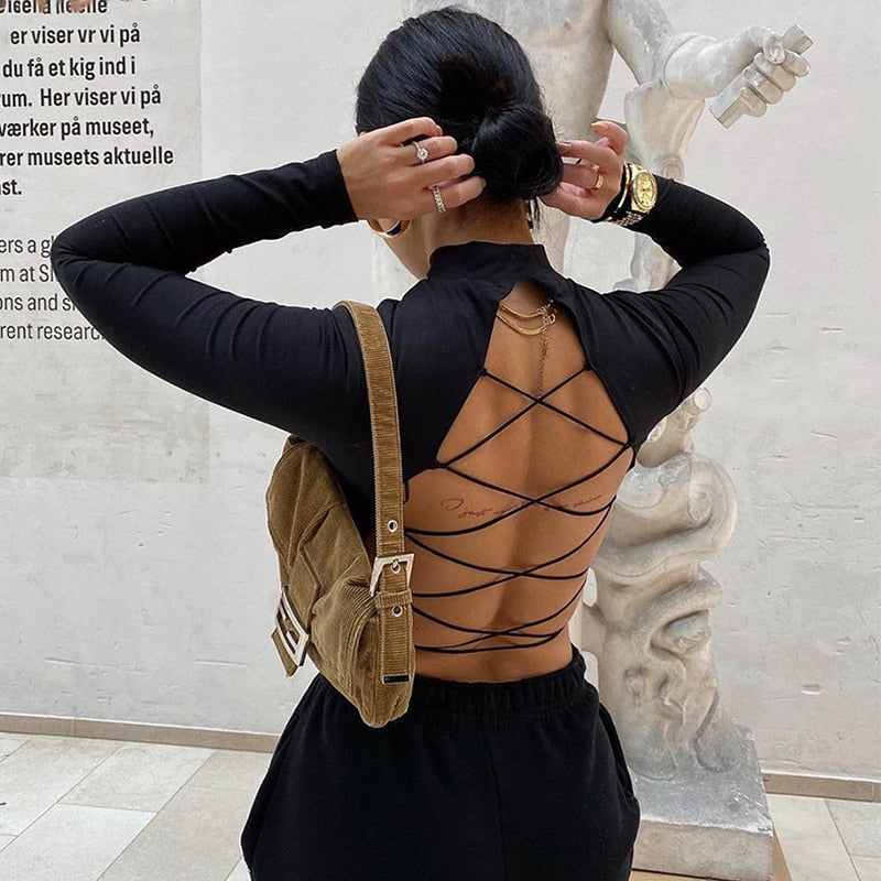 Vroue se sexy ooprug-T-hemp met langmou gekorte top